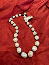 Knotted Pearls on Leather