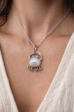 Cancer zodiac crab pendant necklace with pearl detailing in a gold finish